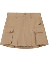 Chocoolate - Pleated Cargo Mini Skirt - Lyst