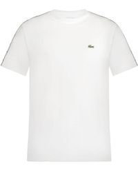 Lacoste - T-Shirt mit Logo-Streifen - Lyst