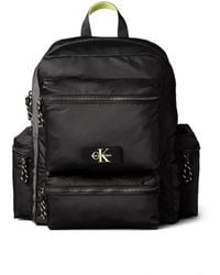 Calvin Klein - Logo-Plaque Multi-Pocket Backpack - Lyst