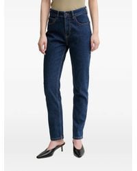 Sisley - Logo-Patch Jeans - Lyst