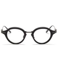 Akoni - Brille Mit Rundem Gestell - Lyst