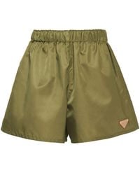 Prada - Shorts Re-nylon con logo triangular - Lyst