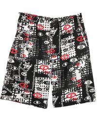 COMME DES GARÇON BLACK - Graphic-Print Shorts - Lyst