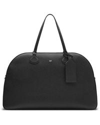 Courreges - Logo-Plaque Leather Duffle Bag - Lyst