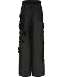 Dolce & Gabbana - Pantaloni con applicazione a fiori - Lyst