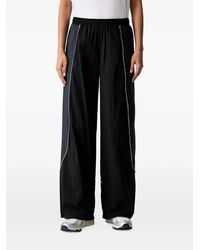 Under Armour - Unstoppable Woven Wind Piped Drawstring-Hem Track Pants - Lyst