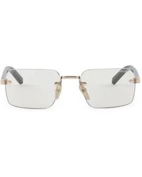 Prada - Sunglasses With The Iconic Metal Plaque - Lyst