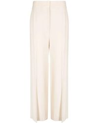 KHAITE - High-Waisted Wide-Leg Trousers - Lyst