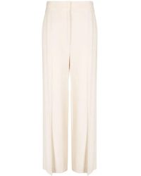 KHAITE - High-Waisted Wide-Leg Trousers - Lyst