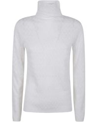 Seventy - Jersey de lana con cuello alto - Lyst