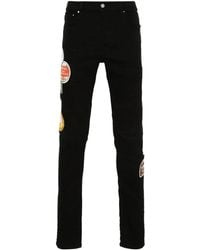 Amiri - Vaqueros Skinny Travel Patch Repair - Lyst