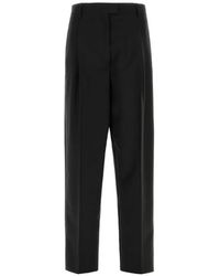 Prada - Pleated Straight-Leg Trousers - Lyst