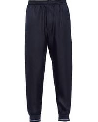 Prada - Pantalones de chándal ajustados con rayas laterales - Lyst