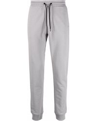 Calvin Klein - Pantalones de chándal con franjas del logo - Lyst
