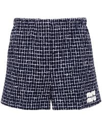 Miu Miu - Tweed-Shorts mit Logo-Patch - Lyst