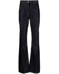 Givenchy - Front-slit Flared Jeans - Lyst