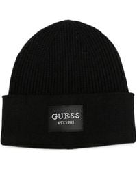 Guess - Logo-Patch Ribbed-Knit Beanie Hat - Lyst