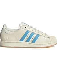 adidas - Superstar Lionel Messi "Cream/Semi Burst" Sneakers - Lyst