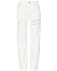 Area - Crystal-Embellished Ripped Jeans - Lyst