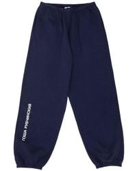 Gosha Rubchinskiy - Logo-Print Cuffed Track Pants - Lyst