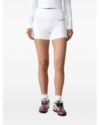 Sporty & Rich - Logo-Print Mini Shorts - Lyst