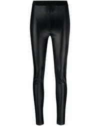 Versace - Logo-waistband Coated leggings - Lyst