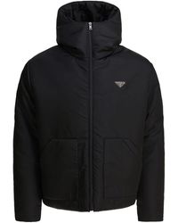 Prada - Plumífero con logo triangular - Lyst