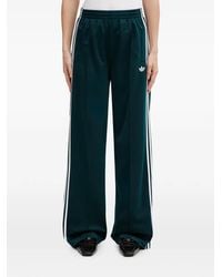 adidas - Firebird Stripe Logo Trousers - Lyst