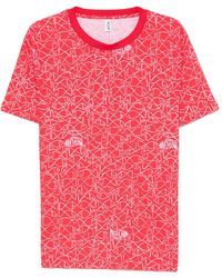 Moschino - T-Shirt mit Fisch-Print - Lyst