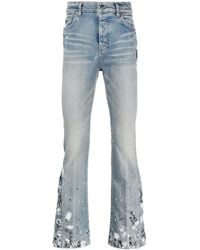 Amiri - Paint-splattered Flared-leg Stretch-denim Jeans - Lyst