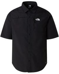 The North Face - Logo-Print Zip-Pocket Shirt - Lyst
