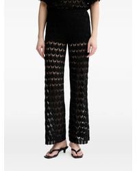 Twinset - Crochet-Knit Logo-Plaque Trousers - Lyst