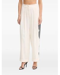 ARMANI EXCHANGE - Buttoned Pleated Trousers - Lyst