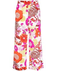 P.A.R.O.S.H. - Pantalones anchos con estampado floral - Lyst