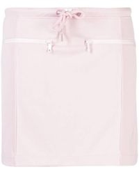 Courreges - Logo-Patch Drawstring Miniskirt - Lyst