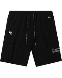 KTZ - Shorts Con Tasche Cargo - Lyst