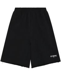 we11done - Logo-Print Raw-Edge Shorts - Lyst