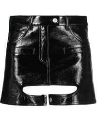 Courreges - Minifalda Chaps con efecto de vinilo - Lyst