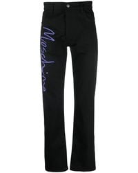 Moschino - Tailored Logo-Print Trousers - Lyst