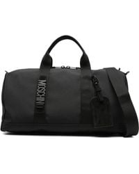 Moschino - Logo-Detailed Holdall - Lyst