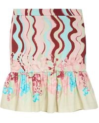 Isolda - Arábia Mini-Rok Met Ruches En Bloemenprint - Lyst