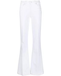 PAIGE - Mid-Rise Flared Jeans - Lyst