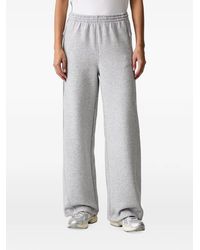 Under Armour - Open Unstoppable Fleece Logo-Print Wide-Leg Track Pants - Lyst