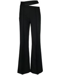 Rohe - Cut-out Flared Wool Trousers - Lyst