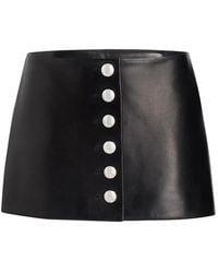 KHAITE - Leren Mini-Rok Met Knoopdetail - Lyst