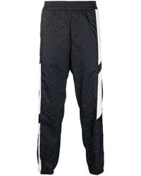Versace Pantaloni sportivi con stampa - Nero