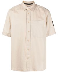 Calvin Klein - Camisa con parche del logo y manga corta - Lyst