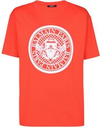 Balmain - T-Shirt mit Münzen-Print - Lyst