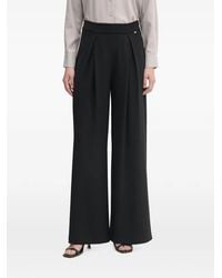 GAUDI - Pantalon Ample À Design Plissé - Lyst