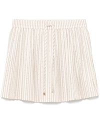 Sandro - Falda corta a rayas - Lyst
